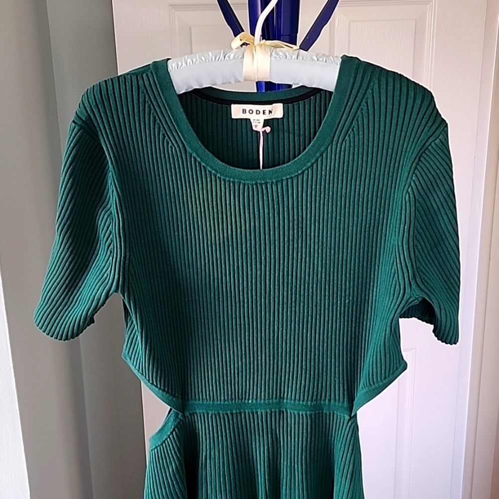 Dress. Mid length. Slits at waist.  80% cotton.